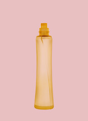 Perfume bottle isolated on pink background