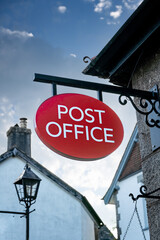 A traditional old fashioned Post Office sign in the UK