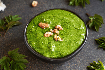 Pesto made of goutweed - wild edible plant collected in spring