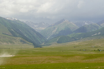 Semenovskoye Grigorevskoye Canyon mountains and green valley Kyrgystan near Issyk Kul. High quality photo