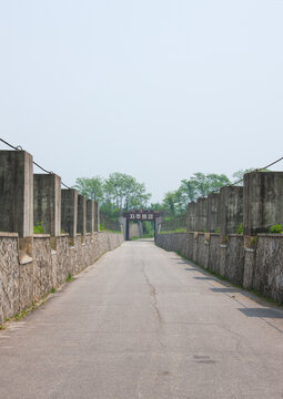 North Korean anti tank invasion concrete blocks on the roadside on the Demilitarized Zone, North Hwanghae Province, Panmunjom, North Korea