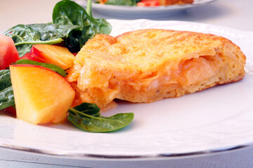 Potato tortilla with spinach salad