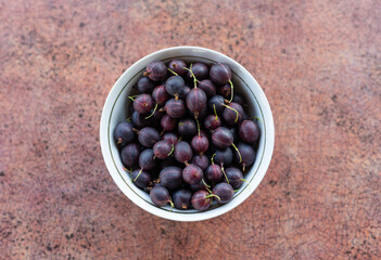 Gooseberries in a bowl on the table