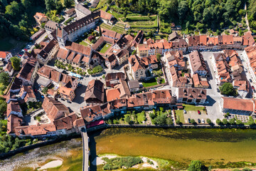Picturesque Swiss village of Saint-Ursanne on the Doubs River, Switzerland. Village Saint-Ursanne...