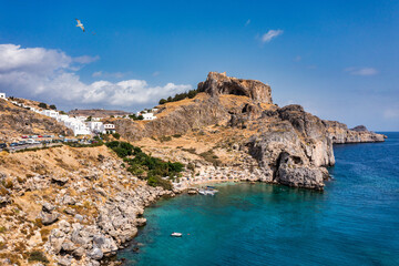 Aerial view on St. Paul's bay in Lindos, Rhodes island, Greece. Panoramic shot overlooking St Pauls Bay at Lindos on the Island of Rhodes, Greece, Europe.