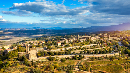 Fototapeta na wymiar View of Montalcino town, Tuscany, Italy. The town takes its name from a variety of oak tree that once covered the terrain. View of the medieval Italian town of Montalcino. Tuscany
