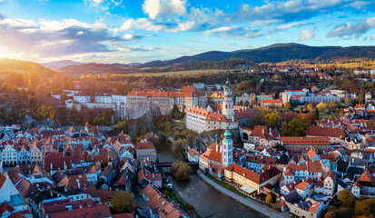 Aerial view of historical centre of Cesky Krumlov town on Vltava riverbank on autumn day overlooking medieval Castle, Czech Republic. View of old town of Cesky Krumlov, South Bohemia, Czech Republic.