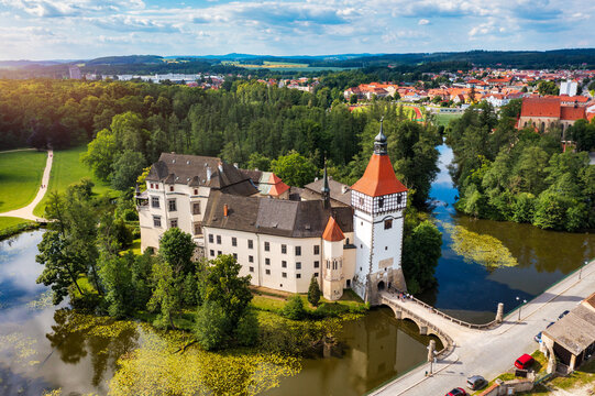 Blatna castle near Strakonice, Southern Bohemia, Czech Republic. Aerial view of medieval Blatna water castle surrounded parks and lakes, Blatna, South Bohemian Region, Czech Republic.