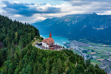 Beautiful top of Harder Kulm in Swiss Interlaken in summer sunset. Turquoise Lake Thun and Brienz...
