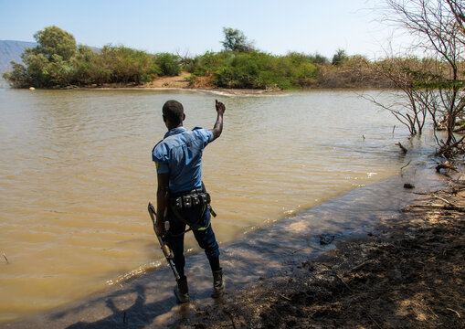Ethiopian policeman in afambo lake, Afar Region, Afambo, Ethiopia