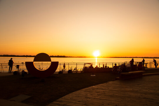 Porto Alegre, Brazil - May 25, 2023: Sunset at Cais Embarcadero Gastronomy and Entertainment Complex - New Guaiba Revitalized Waterfront or Orla do Guaiba, Porto Alegre, Rio Grande do Sul, Brazil