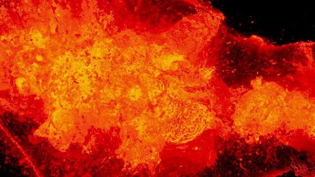 Detailed View of Erupting Volcano With Lava Exploding. Iceland 28.7.2023., Fagradalsfjall. Drone footage, Lava is Exploding and Spreading out of Crater.