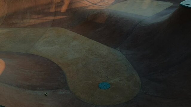 Video of a slow review of a skate park at sunset