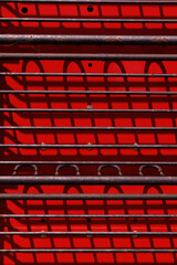 Texture of corrugated metal with fastener and rivets, background for design.