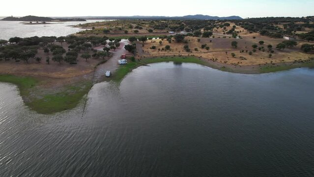 Alentejo lake in Portugal in the province of Alqueva boarder the municipalities of Portel, Moura, Reguengos de Monsaraz, Mour&atilde;o and Alandroal - The largest artificial lake in Europe