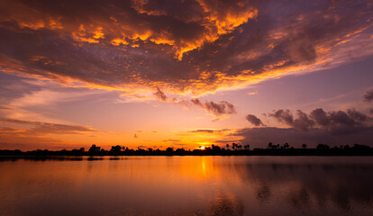 Obraz premium amazing panoramic sunrise or sunset sky with gentle colorful clouds. Long panorama, crop it.holiday travel concept.