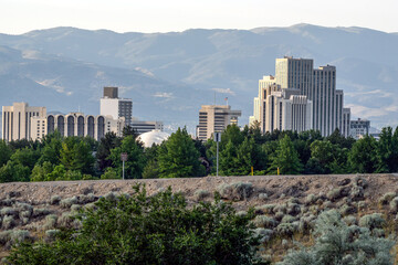 Obraz premium City of Reno Nevada Cityscape with Hotels, Casinos and beautiful mountains in the background with copy space.