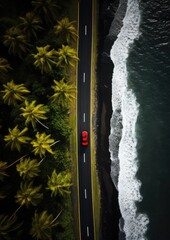 Aerial view on road with red car, sea and palms. Summer travel concept. Wallpaper.