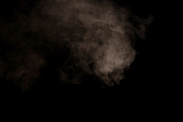 White steam on a black background.