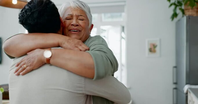 Surprise, visit and man with senior mother in a kitchen hug, happy and excited for reunion. Back, home and elderly woman embracing adult son with wow, love and overwhelmed with care, smile and bond