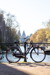 Bike in front of a canal in Amsterdam