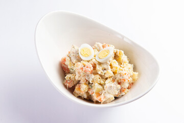 Potato salad in a bowl. Selective focus.