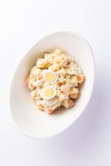 Potato salad in a bowl. Selective focus.