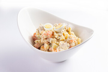 Potato salad in a bowl. Selective focus.