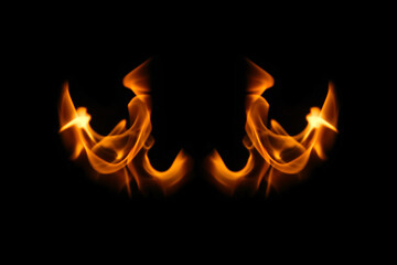 Wings in flame. Wings in Flame and Fire. Black background. Copy space. Out of focus