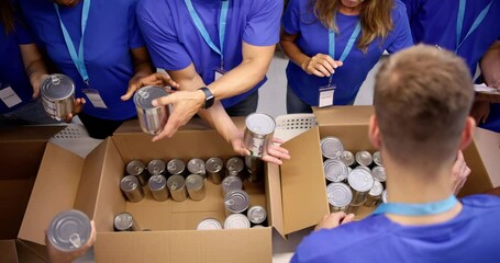 Food Bank Humanitarian Aid In Donation Boxes - Powered by Adobe