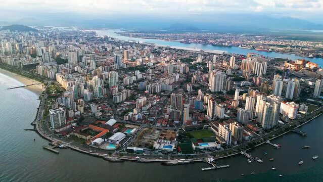 Aerial drone video showing the entire island of Santos with the largest port in Latin America. 