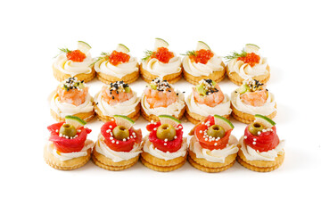canape set with tiger shrimp, salmon, red caviar on white background for food delivery restaurant...