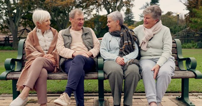 Conversation, nature and mature friends in a park sitting on bench for fresh air together. Happy, smile and group of senior people in retirement in discussion or talking in an outdoor green garden.