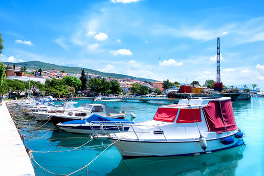 Scenic promenade with ships in Crikvenica, Croatia