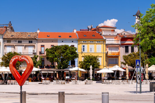 Scenic promenade with restaurants on a sunny day in Crikvenica, Croatia