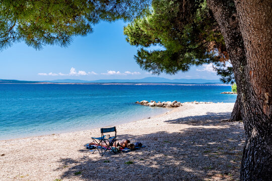 Scenic beach with ships in Crikvenica, Croatia