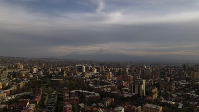 Drone flight through the city of Yerevan in Armenia with a view of Mount Ararat. Cinematic 4k footage.
