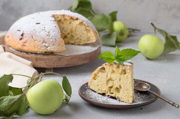 apple pie with green apples, piece of pie, horizontal arrangement