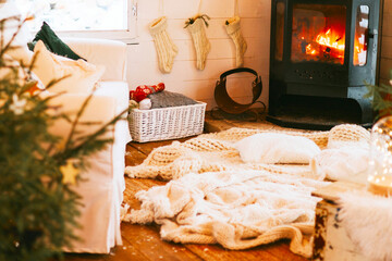 fireplace in living room of cozy winter house, Christmas and New Year holidays and vacation, cosy interior
