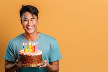 Asian man with cake showing dessert on blue background. Bakery or happy birthday concept. Space for text. Generative AI