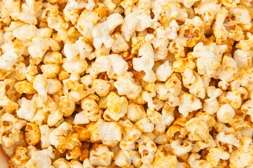 Fried popcorn with caramel abstract background horizontal photo