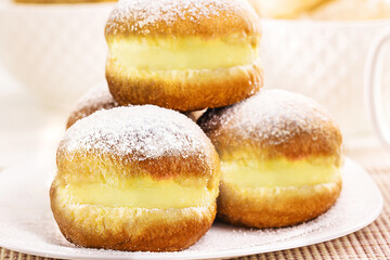 Obraz na płótnie Canvas sweet bread with sugar cream and egg, called Brazilian fried donut called bakery 