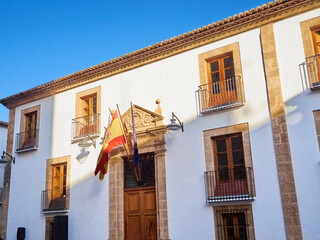 Fototapeta na wymiar Facade of the Town Hall in Javea Old Town. Marina Alta, Province of Alicante, Costa Blanca, Comunidad Valenciana, Spain, Europe