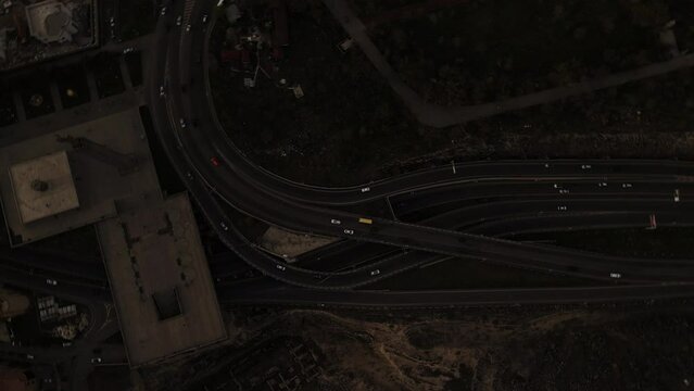 Aerial view of road traffic in the city of Yerevan. Drone flight over the highway in Armenia. Cinematic 4k footage.