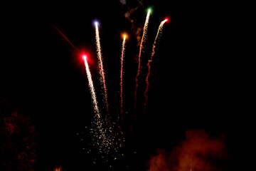 Fototapeta na wymiar Colorful fireworks in the night sky.