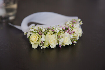 Flower headband for bridesmaid. Selective focus.