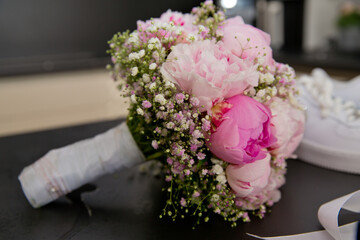 Bride's bouquet of fresh flowers. Close-up. Soft focus.