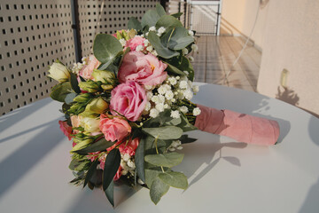 Bride's bouquet of fresh flowers. Close-up.
