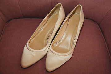 Women's shoes of the bride. Soft focus.