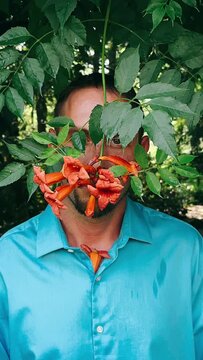 person in a mask with a flower,man in the garden, garden, flowers, statue, sculpture, art, religion, asia, woman, temple, thailand, old, stone, culture, architecture, angel, flower, ancient, park, fac